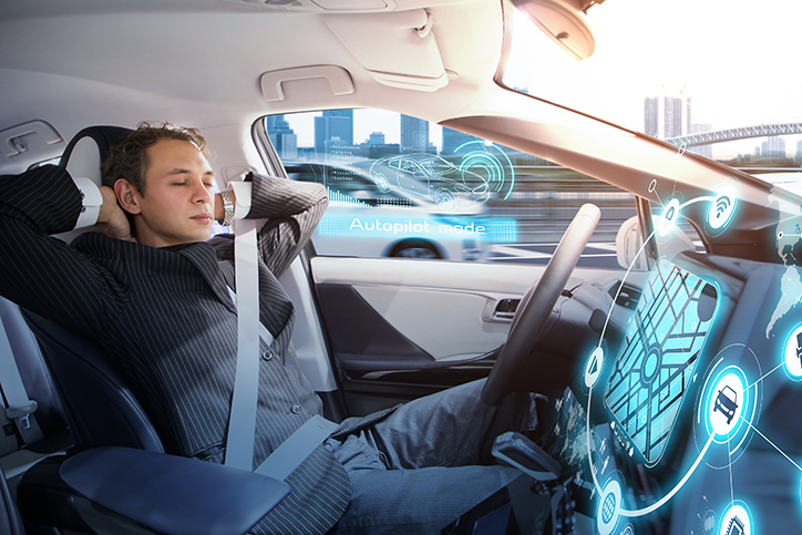 Man sleeping in autonomous car. Self driving vehicle.