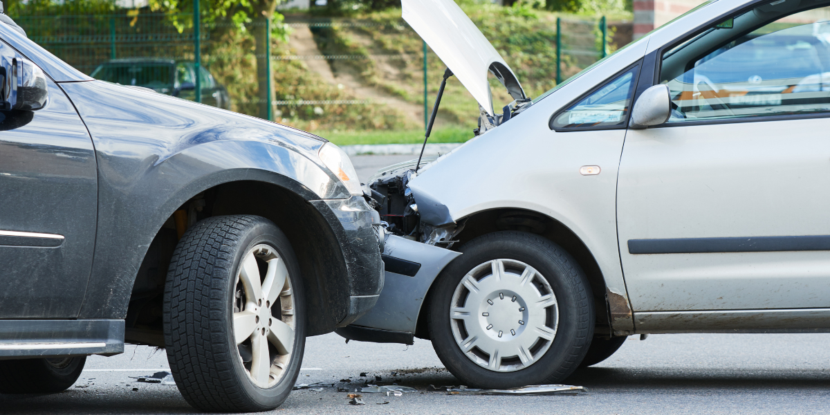 two cars damaged in a crash for cash crime